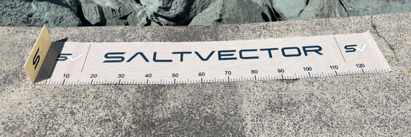 SALTVECTOR Brag Mat with raised end stopper beside coastal water